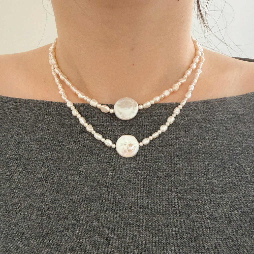 Double layered pearl necklaces styled for lived-in everyday wear