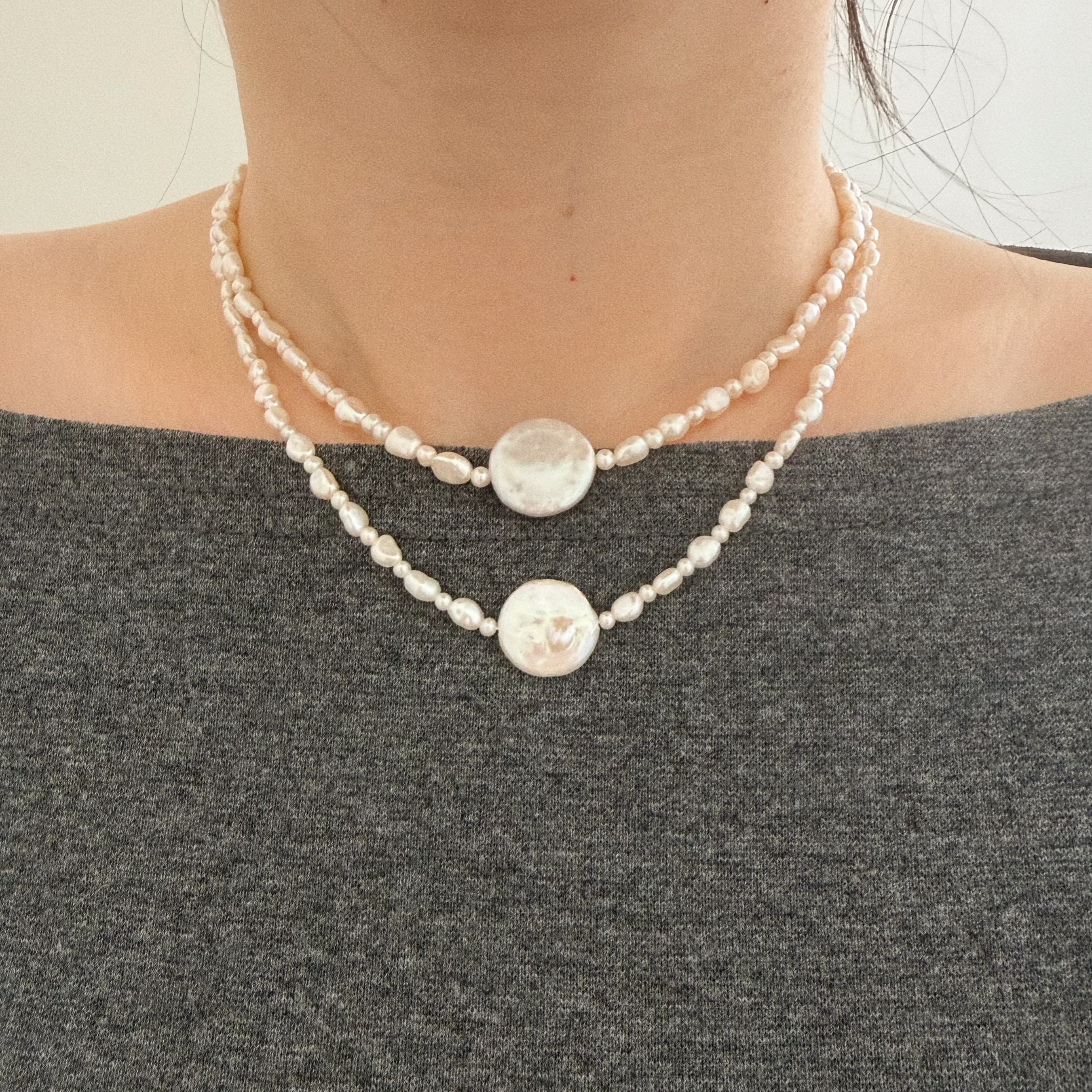 Double layered pearl necklaces styled for lived-in everyday wear