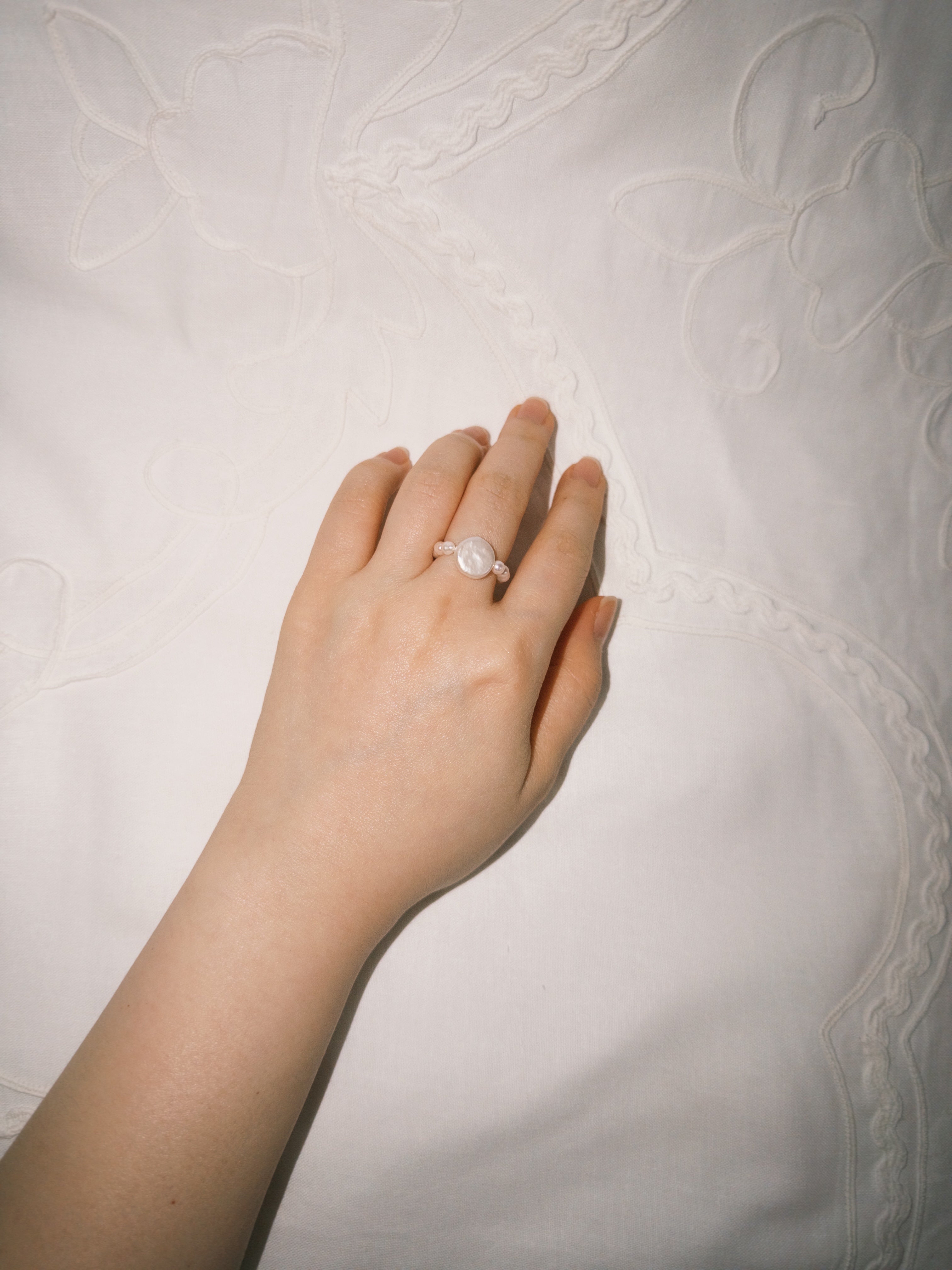 Freshwater pearl ring paired with minimal everyday styling