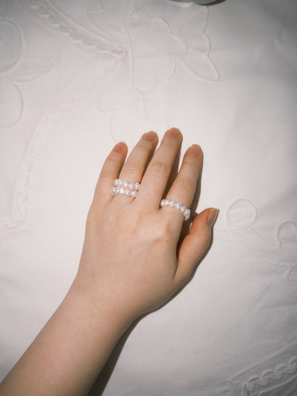 Freshwater pearl ring paired with relaxed everyday jewelry styling