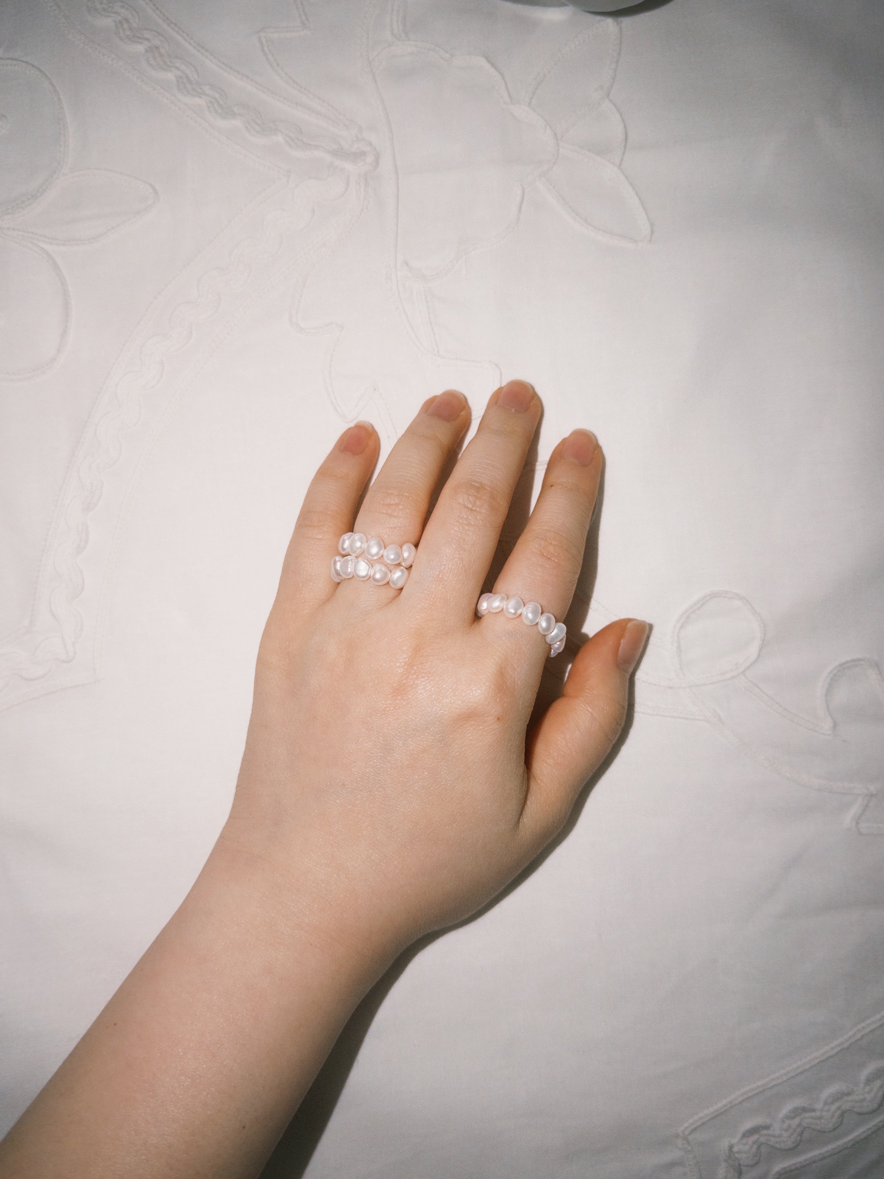 Freshwater pearl ring paired with relaxed everyday jewelry styling